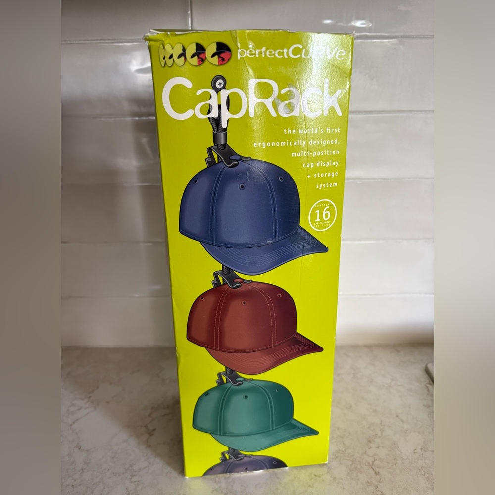 New in Box: “perfectCurve” Cap Rack Holds 16 Caps for Display or Storage